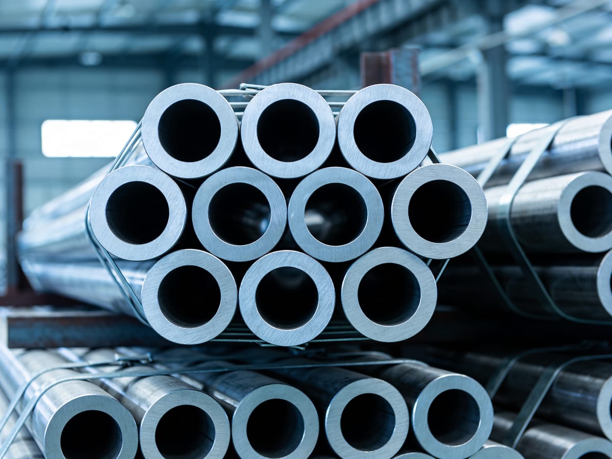 Stacked stainless steel pipes with round ends